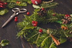 Handmde christmas wreath decoration on rustic wood background, vertical royalty free stock photos Handmde christmas wreath decoration on rustic wood background, vertical royalty free stock photos