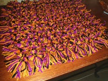 Handmade одеяло pom pom стоковая фотография rf Handmade одеяло pom pom стоковая фотография rf