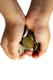 The hands of a child up close holding isolated euro coins stock photography The hands of a child up close holding isolated euro coins stock photography