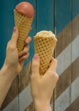 Hands hold two ice creams cornets royalty free stock photos Hands hold two ice creams cornets royalty free stock photos
