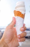 Hands holding melting ice cream stock photos Hands holding melting ice cream stock photos