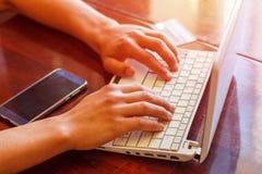 Hands on the laptop keyboard typing the text of the business plan royalty free stock photos Hands on the laptop keyboard typing the text of the business plan royalty free stock photos