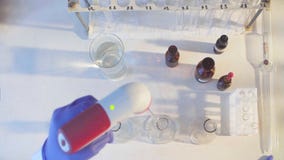 Hands Of A Scientist Pouring Solution Into Flasks Royalty Free Stock Photos Hands Of A Scientist Pouring Solution Into Flasks Royalty Free Stock Photos