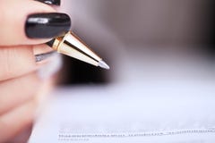 Hands Of Business Woman Signing The Contract Document Royalty Free Stock Image