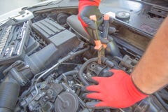 Hands Of Car Mechanic In Auto Repair Service. Auto Mechanic Working In Garage Royalty Free Stock Image