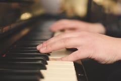 Hands playing the piano (close-up) with oldschool vintage instagram filter. Hands playing the piano (close-up) with oldschool vintage filter Royalty Free Stock Images Hands playing the piano (close-up) with oldschool vintage instagram filter. Hands playing the piano (close-up) with oldschool vintage filter Royalty Free Stock Images
