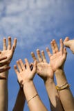 Hands of the team. And the sky Hands of the team. And the sky