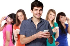 Handsome attractive young man using mobile phone royalty free stock image Handsome attractive young man using mobile phone royalty free stock image