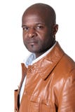 Handsome black man with leather jacket isolated royalty free stock photography Handsome black man with leather jacket isolated royalty free stock photography