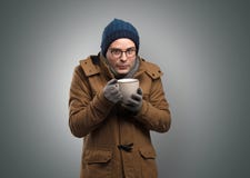 Handsome boy freezing in warm clothing royalty free stock photos Handsome boy freezing in warm clothing royalty free stock photos