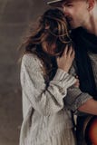 Handsome cowboy man with a guitar kissing beautiful indie woman royalty free stock photography Handsome cowboy man with a guitar kissing beautiful indie woman royalty free stock photography