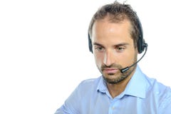 Handsome customer service operator wearing a headset royalty free stock photography Handsome customer service operator wearing a headset royalty free stock photography