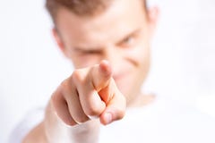 Handsome man, guy pointing to the front, at you, at white background, call to action, motivation royalty free stock photo Handsome man, guy pointing to the front, at you, at white background, call to action, motivation royalty free stock photo