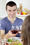 Handsome man having dinner with his girlfriend stock photography Handsome man having dinner with his girlfriend stock photography