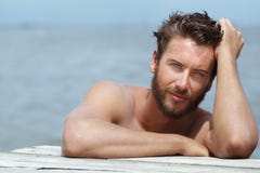 Handsome Man with No Shirt at the Sea royalty free stock photos Handsome Man with No Shirt at the Sea royalty free stock photos