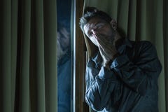 Handsome Sad And Depressed Man Desperate Suffering Depression Problem Feeling Broken Heart Pain Looking Desperate At Home By Royalty Free Stock Image