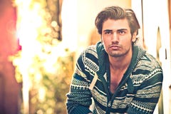 Handsome young man outdoors. Thinking of the future. Stock Photo Handsome young man outdoors. Thinking of the future. Stock Photo