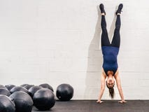 Handstand at the crossfit gym royalty free stock photography Handstand at the crossfit gym royalty free stock photography