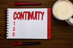 Handwriting text writing Continuity. Concept meaning Unbroken consistent existence operation of something over time Open stock photo Handwriting text writing Continuity. Concept meaning Unbroken consistent existence operation of something over time Open stock photo