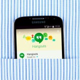 Hangouts app on the Samsung galaxy display. Simferopol, Russia - April 18, 2015: Photo of Hangouts application on the Samsung galaxy display. Google Hangouts is Royalty Free Stock Photo Hangouts app on the Samsung galaxy display. Simferopol, Russia - April 18, 2015: Photo of Hangouts application on the Samsung galaxy display. Google Hangouts is Royalty Free Stock Photo