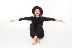 Happiness Beautiful Woman In Hat, Sitting On Floor. Royalty Free Stock Images Happiness Beautiful Woman In Hat, Sitting On Floor. Royalty Free Stock Images