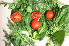 Vegetables for diet greens tomatoes spinach salad royalty free stock image Vegetables for diet greens tomatoes spinach salad royalty free stock image