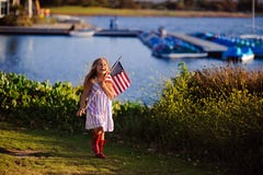 Happy Adorable Little Girl Smiling And Waving American Flag Outs Stock Photography Happy Adorable Little Girl Smiling And Waving American Flag Outs Stock Photography