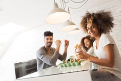 Happy African American family coloring Easter eggs stock image Happy African American family coloring Easter eggs stock image