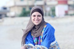 Happy arab muslim woman wearing hijab
