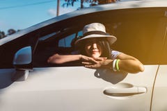 Happy Asian Woman Sitting In New Car On Road,Relax And Free Time,Positive Thinking Royalty Free Stock Images