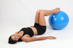 Happy Athletic Young Woman Using Exercise Ball Stock Images Happy Athletic Young Woman Using Exercise Ball Stock Images
