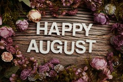 Happy August Alphabet Letters With Flowers Frame On Wooden Background Royalty Free Stock Images