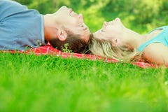 Happy beautiful couple on nature and pregnant in the park stock photo Happy beautiful couple on nature and pregnant in the park stock photo