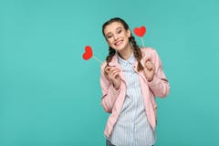Happy beautiful girl in casual style, pigtail hairstyle and pink royalty free stock photography Happy beautiful girl in casual style, pigtail hairstyle and pink royalty free stock photography
