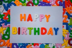 Happy birthday written with alphabet blocks
