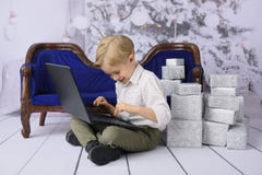 Child with a gift for Christmas. royalty free stock images Child with a gift for Christmas. royalty free stock images
