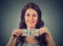 Happy business woman holding money one hundred dollar bill stock photo Happy business woman holding money one hundred dollar bill stock photo