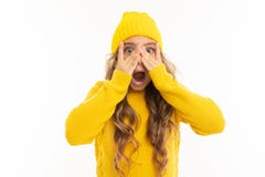 Happy Caucasian Girl In Yellow Hat And Hoody Is Surprised Isolated On White Background Stock Images Happy Caucasian Girl In Yellow Hat And Hoody Is Surprised Isolated On White Background Stock Images