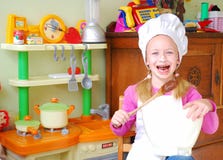 Happy child baker