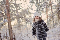 Happy child girl in winter snowy forest stock images Happy child girl in winter snowy forest stock images