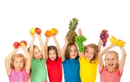Happy children with fruits