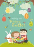 Happy children holding a basket of Easter eggs Stock Photos Happy children holding a basket of Easter eggs Stock Photos