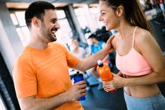 Happy couple in a health club stock image Happy couple in a health club stock image
