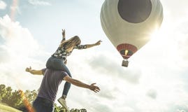 Happy couple in love on honeymoon vacation at hot air b royalty free stock images Happy couple in love on honeymoon vacation at hot air b royalty free stock images