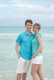 Happy Couple On The Beach Stock Photos Happy Couple On The Beach Stock Photos