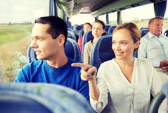 Happy couple or passengers in travel bus royalty free stock images Happy couple or passengers in travel bus royalty free stock images