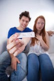 Happy couple with positive pregnancy test royalty free stock images Happy couple with positive pregnancy test royalty free stock images