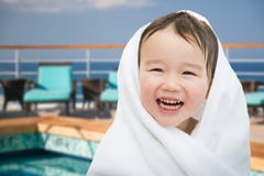 Happy Cute Mixed Race Chinese and Caucasian Boy On Cruise Ship Stock Photo Happy Cute Mixed Race Chinese and Caucasian Boy On Cruise Ship Stock Photo