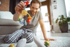 Happy dad playing with his baby at home royalty free stock photos Happy dad playing with his baby at home royalty free stock photos