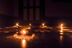 Happy Diwali. Diya Oil Lamps in DIPAWALI celebration decorated over Handmade Rangoli stock photos Happy Diwali. Diya Oil Lamps in DIPAWALI celebration decorated over Handmade Rangoli stock photos